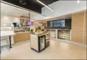  ?? PHOTO COURTESY OF DUNKIN’ DONUTS ?? The interior of a new next-generation Dunkin’ Donuts concept store coming to Avon. The 1,859 square foot location will feature a new modern design and open layout to create a positive, and energetic environmen­t.