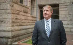  ?? Andrew Rush/Post-Gazette ?? Allegheny County Executive Rich Fitzgerald, seen here outside the county courthouse Friday, plans to attend Joe Biden’s inaugurati­on Wednesday.