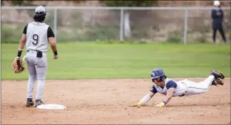  ?? ?? Habeba Mostafa/ The Signal (Left) West Ranch’s Ashton Tsukushima slides into second base after a two-rbi double during the sixth inning of Thursday’s game against Castaic. (Right) West Ranch’s Nolan Toll (9) is greeted behind home plate by teammates Landon Hu (left) and Ty Diaz (right) after scoring on Tsukushima’s double.