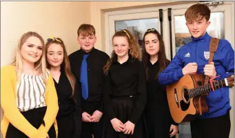  ??  ?? Ciarraí Lan/Mid Kerry Ballad Group from Keel Aoife Hichey, Michael Griffin, Hannah Joy, Cianna Foley and Liam Evans with (left) teacher Heather Grey participat­ing in the Scór na nÓg County finals in the Celtic Steps Arena, Killarney Racecourse on Saturday.