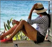  ??  ?? MEMORiEs: Meghan with her campervan, top, and relaxing on Waiheke Island during her trip