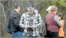  ??  ?? Niagara FPV Squad member Abbey Solomon uses first-person goggles to fly his racing drone in Fonthill.