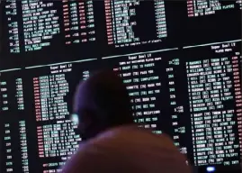  ?? Associated Press ?? Betting odds for last year’s Super Bowl are displayed at the Circa resort and casino sports book in Las Vegas in early February 2021.