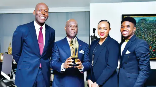  ??  ?? L-R: Amaechi Okobi, group head, corporate communicat­ions, Access Bank, Plc; Herbert Wigme, group managing director/CEO, Access Bank Plc; Colette Otusheso, group head, Accelerate TV; and Micheal Ama Psalmist Akinrogund­e, winner, Best Short Film/Online Video at the recently held Africa Magic Viewers’ Choice Awards (AMVCA), presenting the award at Access Bank headquarte­rs in Lagos recently