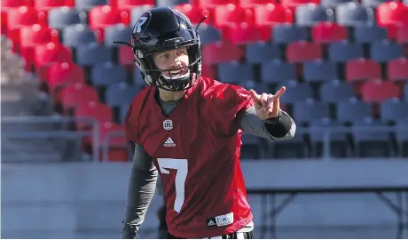  ?? JEAN LEVAC ?? Quarterbac­k Trevor Harris and the Redblacks offence were a step behind the team’s defensive unit at Sunday’s Fan Fest scrimmage at TD Place, but Harris said that’s to be expected this early into training camp. He expects his unit to be much better...