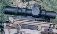  ??  ?? 测试用的POF变革卡­宾枪安装了Triji­con公司的Trij­icon 1～8×28mm光学瞄准镜