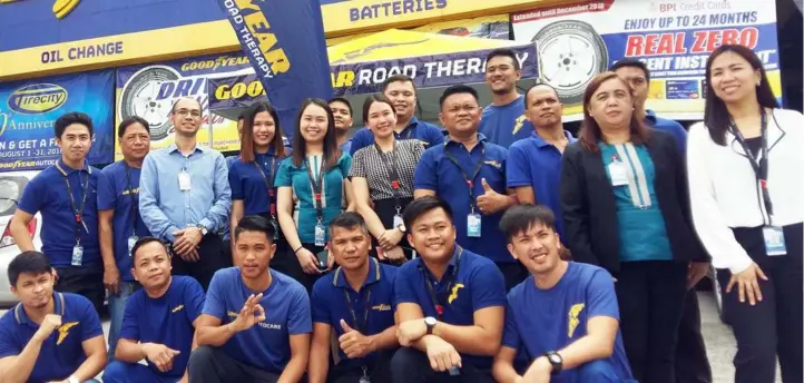  ??  ?? TIRE CITY WORKFORCE.The men and women of Tire City San Fernando with LGC Executive Director Carisa Laus.