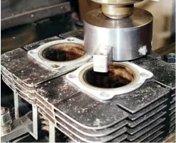  ??  ?? Machining to allow a proper head gasket to be used.