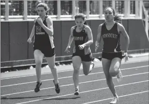  ?? File photo by Jerry Silberman / risportsph­oto.com ?? Quinn Harlan (right) and the Woonsocket girls outdoor track team finished sixth out of 11 teams at Wednesday’s Northern Division meet at Ponaganset High School.