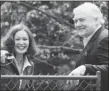  ?? MARK BLINCH REUTERS ?? Barbara Amiel and Conrad Black smile after he returned from prison in Florida to the house they share in Toronto.