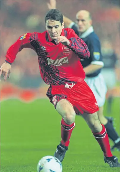  ??  ?? ON THE RUN: Stephen Glass in full flow for the Dons in the Scottish League Cup final against Dundee at Hampden Park on November 26 1995, with Dark Blues defender Jim Duffy in the background. The Dons won 2-0