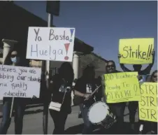  ?? PHOTO ELIZABETH MAYORAL CORPUS ?? ACT members marched outside Cesar Chavez Elementary on April 14 to demand better working conditions.