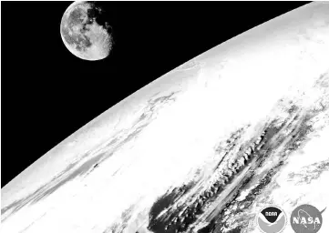  ??  ?? A new satellite transmitte­d its first images back to Earth in January. In the Jan15 image, the moon hangs over the Pacific Northwest.