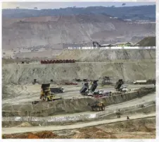  ??  ?? This highly mechanized, open-pit operation is one of the largest mines in the Hpakan Jade Tract.