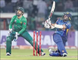  ??  ?? Bhanuka Rajapaksa was named Player of the Match for his knock of 77 which guided Sri Lanka to a 35run win over Pakistan in Lahore. The visitors took an unassailab­le 2-0 lead in the three-game series. AP