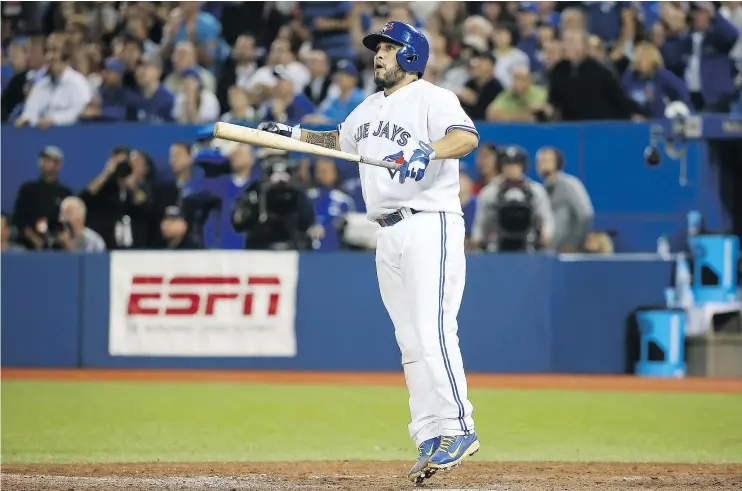  ?? GETTY IMAGES FILES ?? Dioner Navarro, seen watching a game-tying home run last September, rejoined the Toronto Blue Jays in Baltimore on Monday after being traded by Chicago.