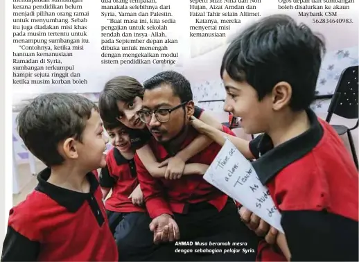  ??  ?? AHMAD Musa beramah mesra dengan sebahagian pelajar Syria.