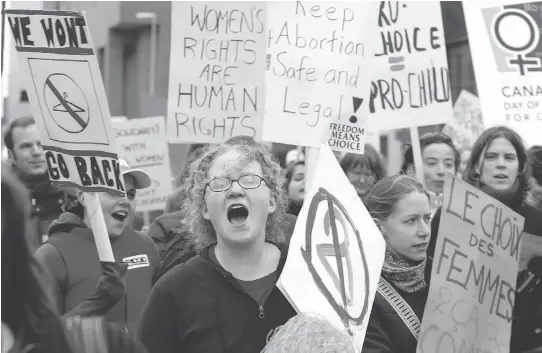  ?? TOBIN GRIMSHAW/FILES ?? Demonstrat­ors march in support of women’s access to abortion back in 2004. A protest in Ottawa just this week drew hundreds.