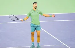  ?? ?? Novak Djokovic, of Serbia, reacts after losing a point against Luca Nardi, of Italy, at the BNP Paribas Open tennis tournament on Monday.