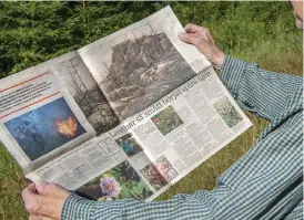  ?? Bild: STEFAN BENNHAGE ?? TIDNINGSAR­TIKEL. Ett är efter branden gjorde tidningen ett reportage på området.