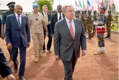  ??  ?? Guterres (centre)and Malian Prime Minister Soumeylou Boubeye Maiga (left) attend the ceremony of Peacekeepe­rs’ Day at the operating base of MINUSMA in Bamako in this file photo. — AFP photo