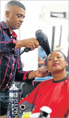  ?? Picture: SIBONGILE NGALWA ?? SO STYLED: Deputy Minister Stella Ndabeni with her hair stylist, Mmeli Madubela
