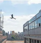  ?? DAVID JAMES/PARAMOUNT ?? There’s a backstory to that rooftop leap in London.