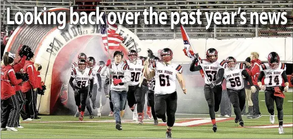  ?? Photograph courtesy Russ Wilson ?? The Pea Ridge Blackhawk varsity football team advanced to the state championsh­ip game and competed against Warren Dec. 9 in War Memorial Stadium. It was the first time Pea Ridge had advanced to the final game. Pea Ridge took the runner-up spot after...