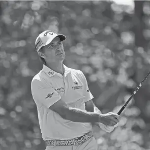  ?? NICK WASS/AP ?? Kevin Kisner watches his tee shot on the fifth hole during the first round of the BMW Championsh­ip last Thursday at Caves Valley Golf Club.