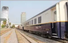  ?? TEP SONY ?? A train sits on the tracks outside the Phnom Penh train station yesterday.