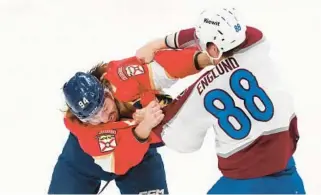  ?? REINHOLD MATAY/AP ?? Panthers left wing Ryan Lomberg, left, fights with Avalanche defenseman Andreas Englund during the second period Saturday in Sunrise.