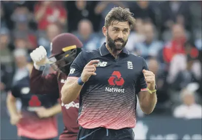  ??  ?? Liam Plunkett celebrates taking the wicket of the West Indies’ Shai Hope during England’s ODI win on Sunday.