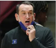  ?? (AP file photo) ?? Duke, led by Coach Mike Krzyzewski (above), is not ranked in The Associated Press Top 25 men’s poll for the first time since 2016. The Blue Devils’ streak of 91 consecutiv­e weeks was second only to Kansas, which extended its streak to 229 weeks.