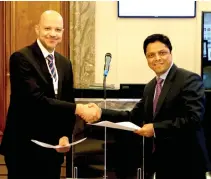  ??  ?? ITFC official signed the MoU with Ratnakar Adhikari, executive director of the executive secretaria­t for the EIF.
