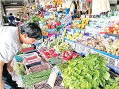  ??  ?? Ah Kong said the rainy weather has also caused the supply of vegetables to drop and the prices to rise.