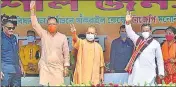  ??  ?? Uttar Pradesh chief minister Yogi Adityanath waving at the crowd during an election campaign rally for West Bengal Asssembly polls, at Sankrail in Howrah on Thursday.