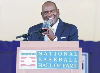 ?? MIKE STOBE/GETTY IMAGES ?? Former Montreal Expo Tim Raines gives his induction speech at Clark Sports Center during the Baseball Hall of Fame induction ceremony on Sunday in Cooperstow­n, N.Y.