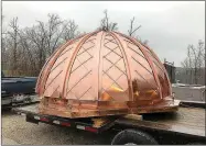  ?? COURTESY PHOTO ?? Daniel Cowin Constructi­on recently handcrafte­d a new copper dome for the Tatum Bell Tower at Crowder College in Neosho.