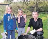  ??  ?? Staff and pupils at Small Isles Primary School are celebratin­g after being awarded their fifth Green Flag.