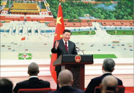  ?? DING HAITAO / XINHUA ?? President Xi Jinping delivers a speech after receiving the credential­s presented by 42 new ambassador­s to China on Tuesday at the Great Hall of the People in Beijing.