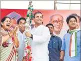  ?? PTI ?? ▪ Congress president Rahul Gandhi holds a bow during a public meeting, in Khargone, on Tuesday.