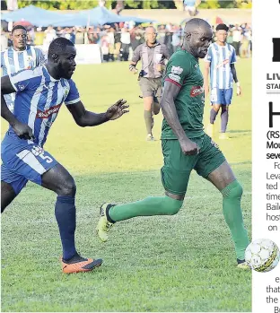  ?? IAN ALLEN ?? Levaughn Williams (right) from Humble Lion dribbles away from Ricardo Campbell (left) from Mount Pleasant United to score the only goal of the match as Humble Lion register their first win of the 2018-19 Red Stripe Premier League season on Sunday.