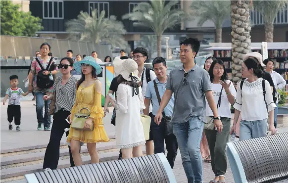  ?? Pawan Singh / The National ?? With an influx of tourists from Russia and China, along with others en route to the World Cup, Dubai anticipate­s an unusually busy summer season