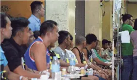  ?? TED ALJIBE/AFP VIA GETTY IMAGES ?? People who fell ill after drinking coconut wine wait for treatment Monday at the Philippine General Hospital in Manila.