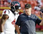  ?? ED ZURGA — THE ASSOCIATED PRESS ?? Houston Texans quarterbac­k Deshaun Watson (4) listens to head coach Bill O’Brien before an NFL preseason football game against the Kansas City Chiefs in Kansas City, Mo.