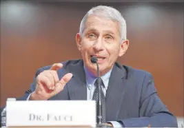  ?? Kevin Dietsch The Associated Press ?? Dr. Anthony Fauci, director of the National Institute for Allergy and Infectious Diseases, testifies Tuesday before a Senate committee hearing on Capitol Hill.