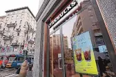  ?? ANTONIO CALANNI/ASSOCIATED PRESS ?? Italians are taking a wait-and-see attitude about Starbucks’ new Oleato coffee offerings, which add olive to the brew. This coffeehous­e is in Milan.