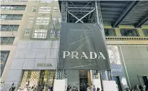  ?? ?? Prada is leading the pack with an $835 million deal to buy a buildings at 720-24 Fifth Ave. (above). Meanwhile, big-box retail isn’t moving. Massive holes, like the former Bed Bath & Beyond space at 1932 Broadway (left), are waiting to be filled.
