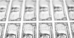  ??  ?? United States one dollar bills are seen on a light table at the Bureau of Engraving and Printing in Washington. Wage increases – added to rising costs in more industries due to US tariffs on steel and aluminium and hundreds of billions of dollars in imports from China – could become a concern for the central bank as it works to head off inflation without slowing economic growth. — Reuters photo