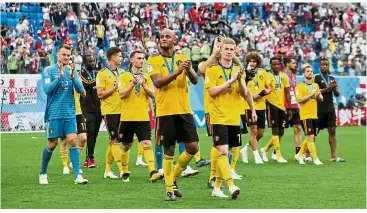  ?? — Reuters ?? A job well done: Belgium players celebratin­g with their bronze medals.